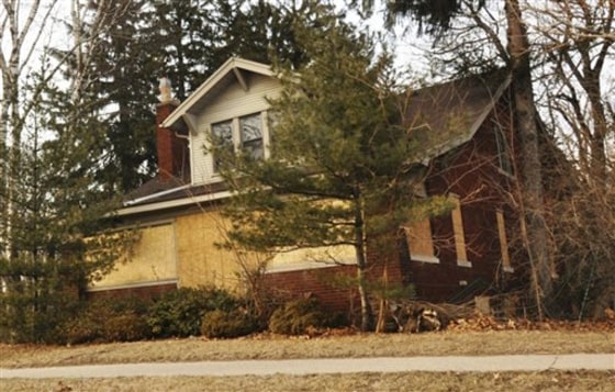 Taylor officials are asking for a buck for the two-story Arts and Crafts-style home built in 1926 that features four bedrooms and two bathrooms.